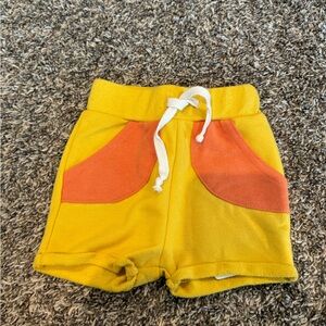 Dot Dot Smile baby yellow and orange shorts new with tags size 6-12 months